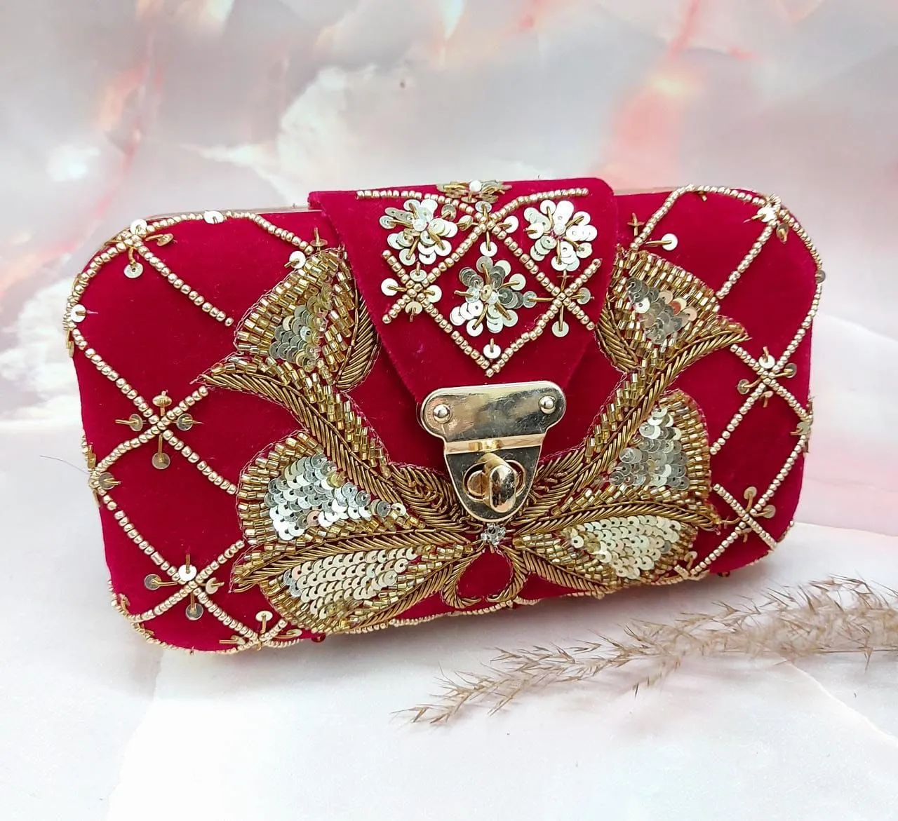 Red embroidered clutch
